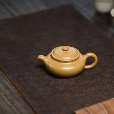 Yixing Zisha Teapot [Mini Fanggu Pot] (Huangjin Zhu Ni – 100ml)
