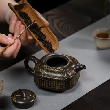 Full Handmade Yixing Zisha Teapot [Chou Jiao Zhu Gu] (Feicui Qing Zi Ni – 300ml)
