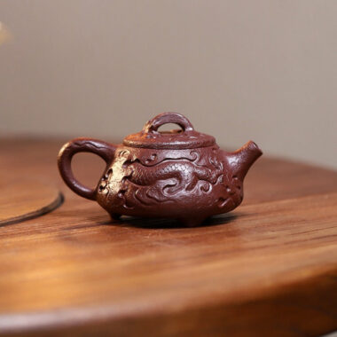Yixing Zisha Teapot [Dragon Gong Chun Shi Piao] (Zi Ni Firewood Firing – 150ml)