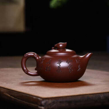 Full Handmade Yixing Zisha Teapot [Shou Tao Pot] (Di Cao Qing – 310ml)