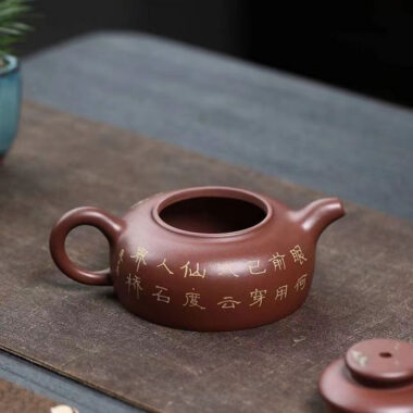 Yixing Zisha Teapot [Shanshui Han Jiang Julun] (Di Cao Qing – 250ml)