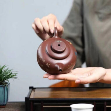 Yixing Zisha Teapot [Shanshui Han Jiang Julun] (Di Cao Qing – 250ml)
