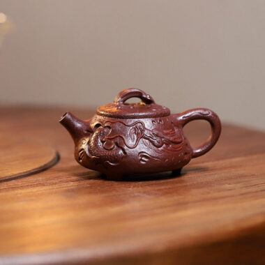 Yixing Zisha Teapot [Dragon Gong Chun Shi Piao] (Zi Ni Firewood Firing – 150ml)