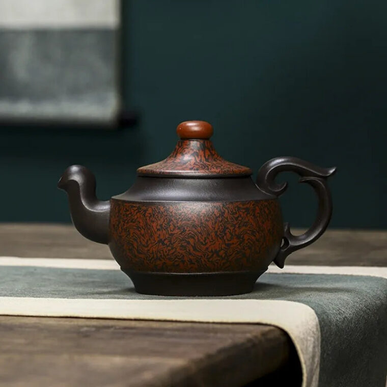 Full Handmade Yixing Zisha Teapot [Dancing Phoenix] (Hei Jiao Ni – 350ml)
