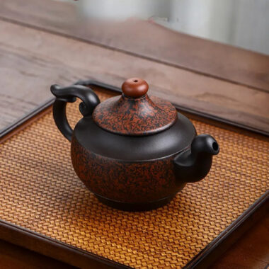Full Handmade Yixing Zisha Teapot [Dancing Phoenix] (Hei Jiao Ni – 350ml)