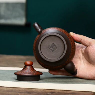 Full Handmade Yixing Zisha Teapot [Dancing Phoenix] (Hei Jiao Ni – 350ml)