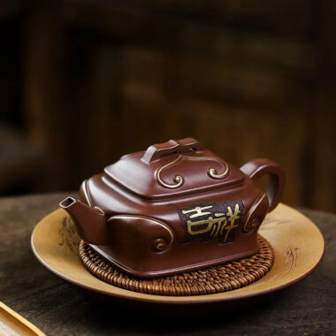 Full Handmade Yixing Zisha Teapot [Ji Xiang Ruyi] (Gu Zi Ni – 340ml)