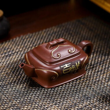 Full Handmade Yixing Zisha Teapot [Ji Xiang Ruyi] (Gu Zi Ni – 340ml)