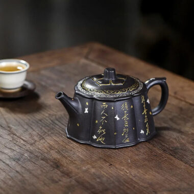 Full Handmade Yixing Zisha Teapot [Jin Ling Hua] (Hei Luolan – 350ml)