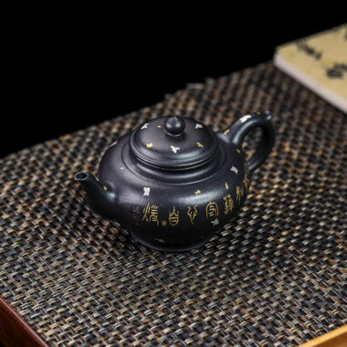 Full Handmade Yixing Zisha Teapot [Jixiang Xiao Ying] (Hei Luolan – 120ml)