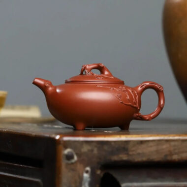 Full Handmade Yixing Zisha Teapot [Plum Blossom Tripod Pot] (Qing Shui Ni – 370ml)