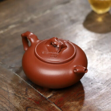 Full Handmade Yixing Zisha Teapot [Plum Blossom Tripod Pot] (Qing Shui Ni – 370ml)