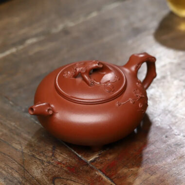 Full Handmade Yixing Zisha Teapot [Plum Blossom Tripod Pot] (Qing Shui Ni – 370ml)