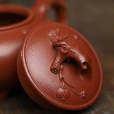 Full Handmade Yixing Zisha Teapot [Plum Blossom Tripod Pot] (Qing Shui Ni – 370ml)
