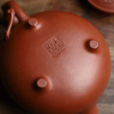 Full Handmade Yixing Zisha Teapot [Plum Blossom Tripod Pot] (Qing Shui Ni – 370ml)