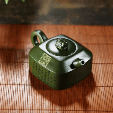 Full Handmade Yixing Zisha Teapot [Wanxiang Gengxin] 1 Pot 5 Cups Set (Douqing sha – 260ml)