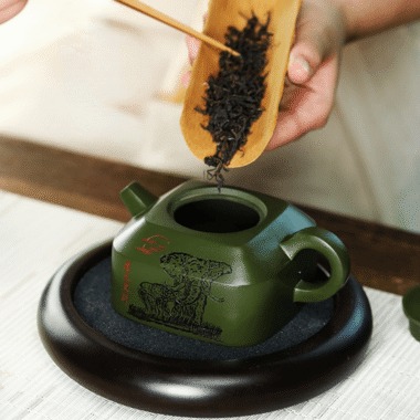 Full Handmade Yixing Zisha Teapot [Wanxiang Gengxin] 1 Pot 5 Cups Set (Douqing sha – 260ml)