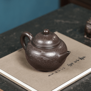 Yixing Zisha Teapot [Dragon Carved Shui Ping] (Zi Ni – 250ml)