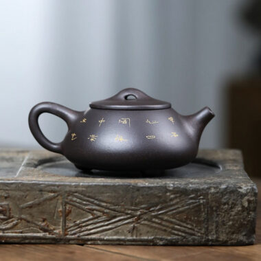 Yixing Zisha Teapot [Lotus Leaf Shi Piao] (Hei Jin Sha – 220ml)