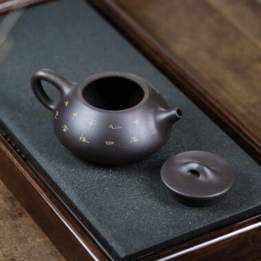 Yixing Zisha Teapot [Lotus Leaf Shi Piao] (Hei Jin Sha – 220ml)