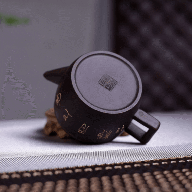 Yixing Zisha Teapot [Meixiang Han Wa] (Hei Jin Sha – 180ml)