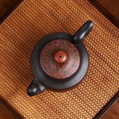 Full Handmade Yixing Zisha Teapot [Dancing Phoenix] (Hei Jiao Ni – 350ml)