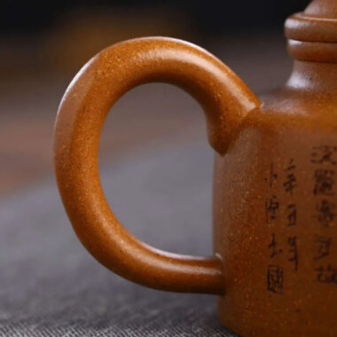 Full Handmade Yixing Zisha Teapot [Niu Gai Lianzi Pot] (Jiang Po Ni – 220ml)